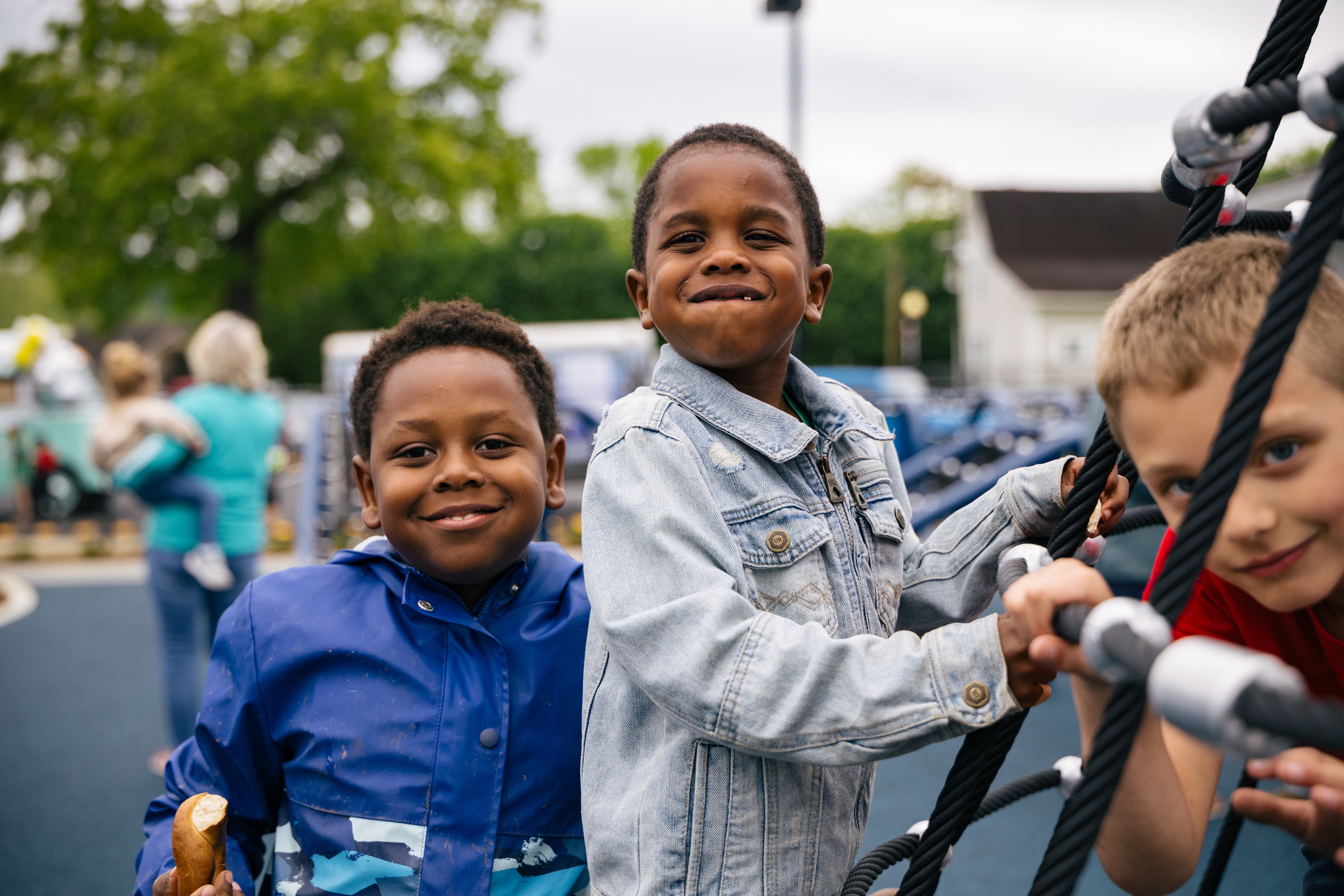 Children playing and smiling at Pendergrass Park